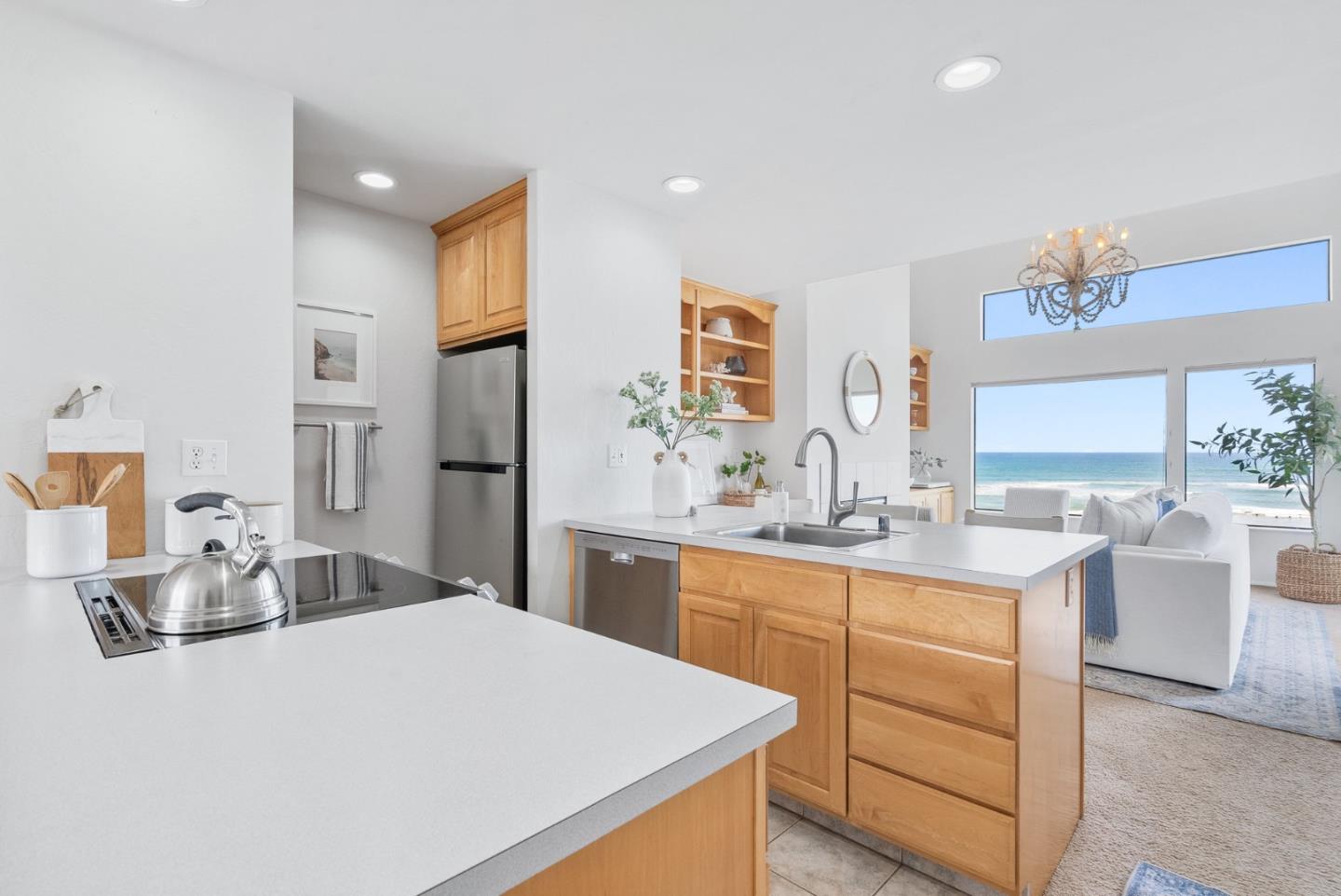 101 Shell Road, Unit 271 Watsonville, CA 95076 - Photo 6 of 43 a kitchen with a sink stove and refrigerator
