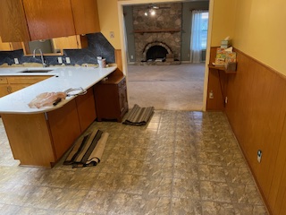 7001 Twin Crest Drive Austin, TX 78752 - Photo 3 of 14 a view of a living room with a sink and a rug