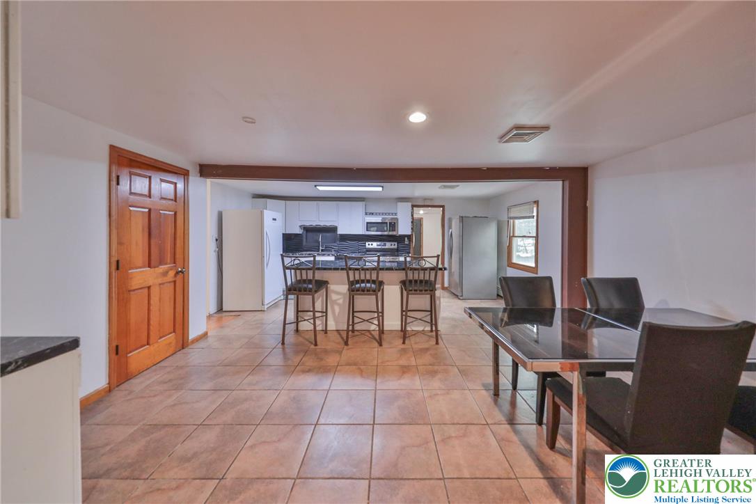 257 Hoffman Road Wind Gap, PA 18091 - Photo 28 of 52 a dining room with furniture and chandelier