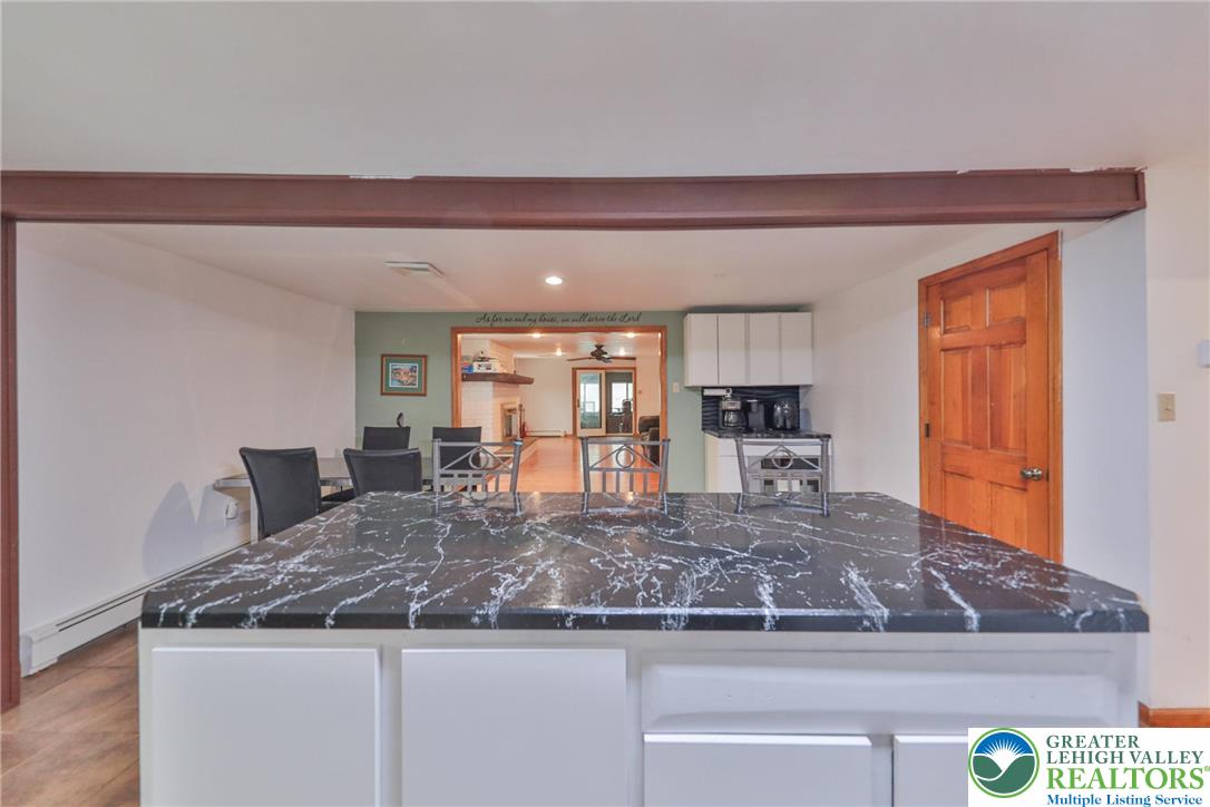 257 Hoffman Road Wind Gap, PA 18091 - Photo 30 of 52 a kitchen with kitchen island a counter top space and a sink