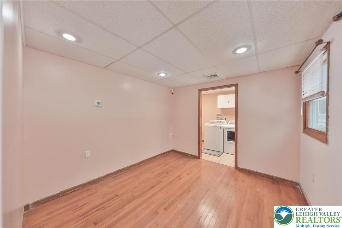 257 Hoffman Road Wind Gap, PA 18091 - Photo 33 of 52 a view of empty room with wooden floor and fan