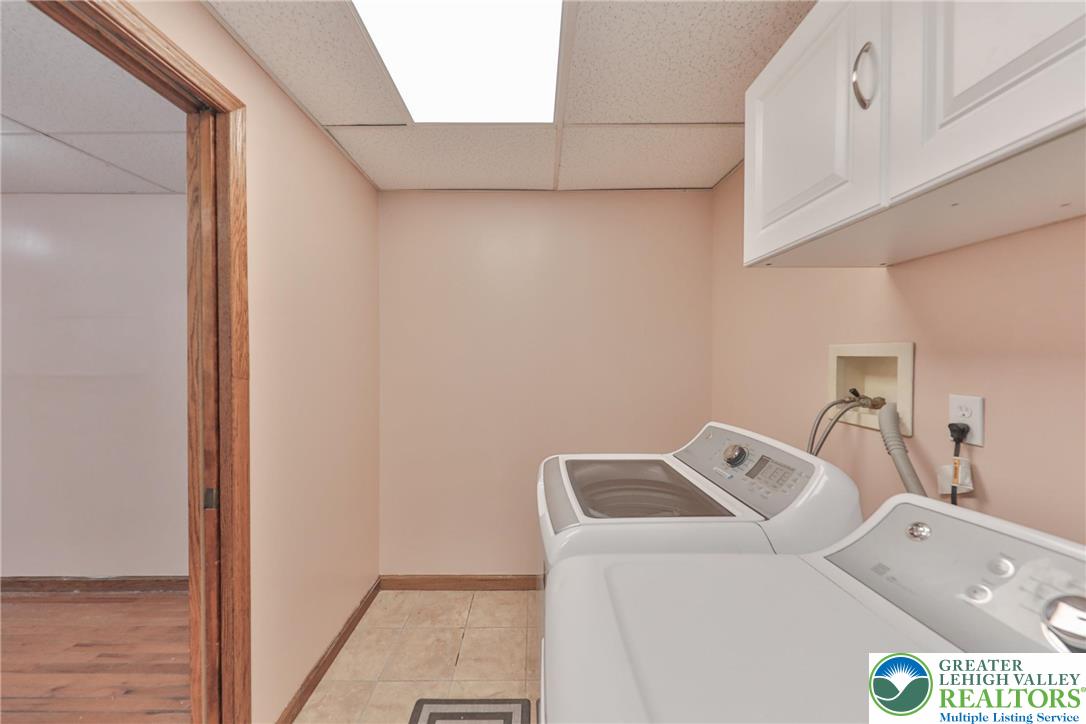 257 Hoffman Road Wind Gap, PA 18091 - Photo 34 of 52 a utility room with dryer and washer