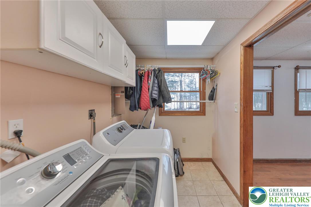 257 Hoffman Road Wind Gap, PA 18091 - Photo 35 of 52 a utility room with dryer and washer