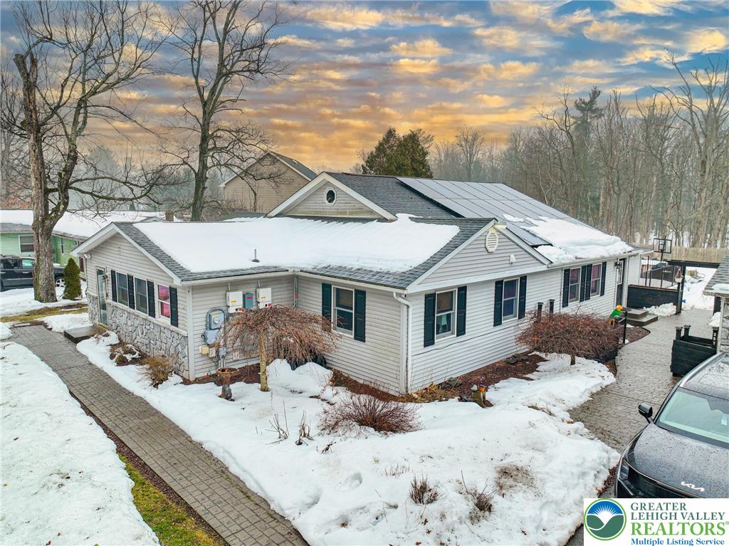 257 Hoffman Road Wind Gap, PA 18091 - Photo 36 of 52 a front view of a house with a yard