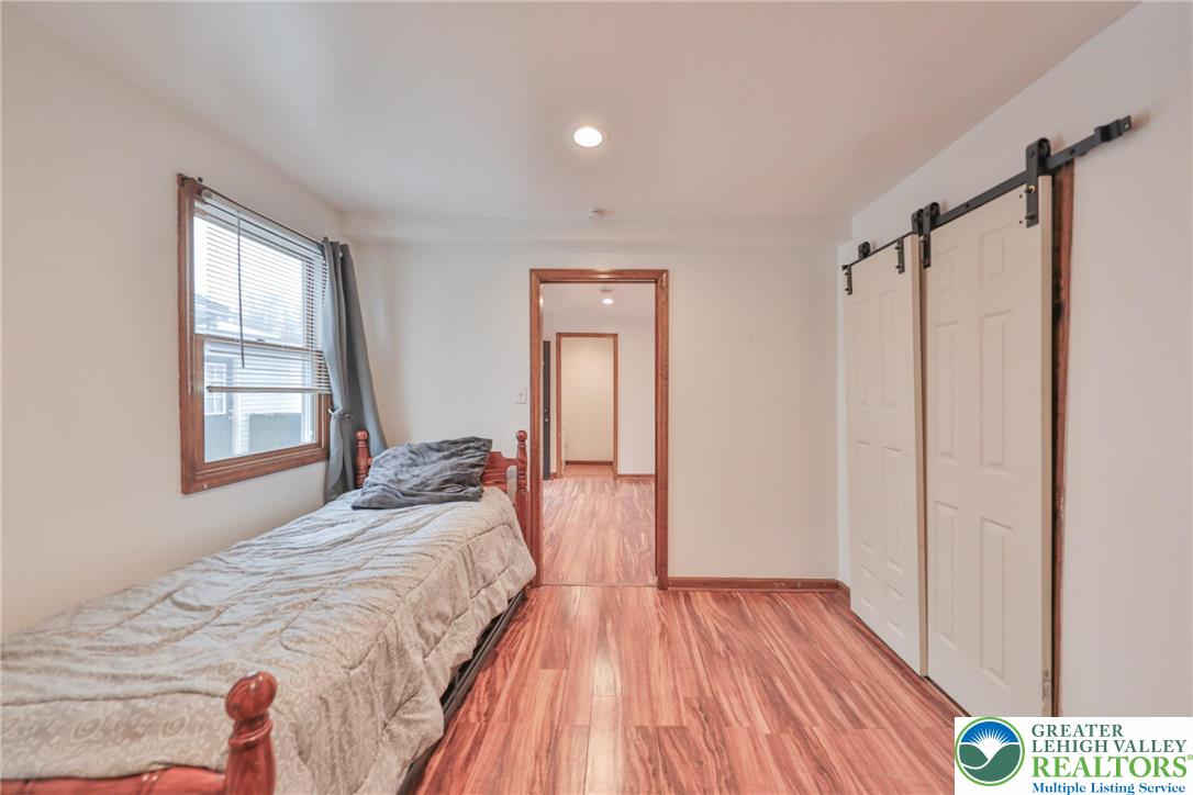 257 Hoffman Road Wind Gap, PA 18091 - Photo 40 of 52 a bedroom with a bed and a window