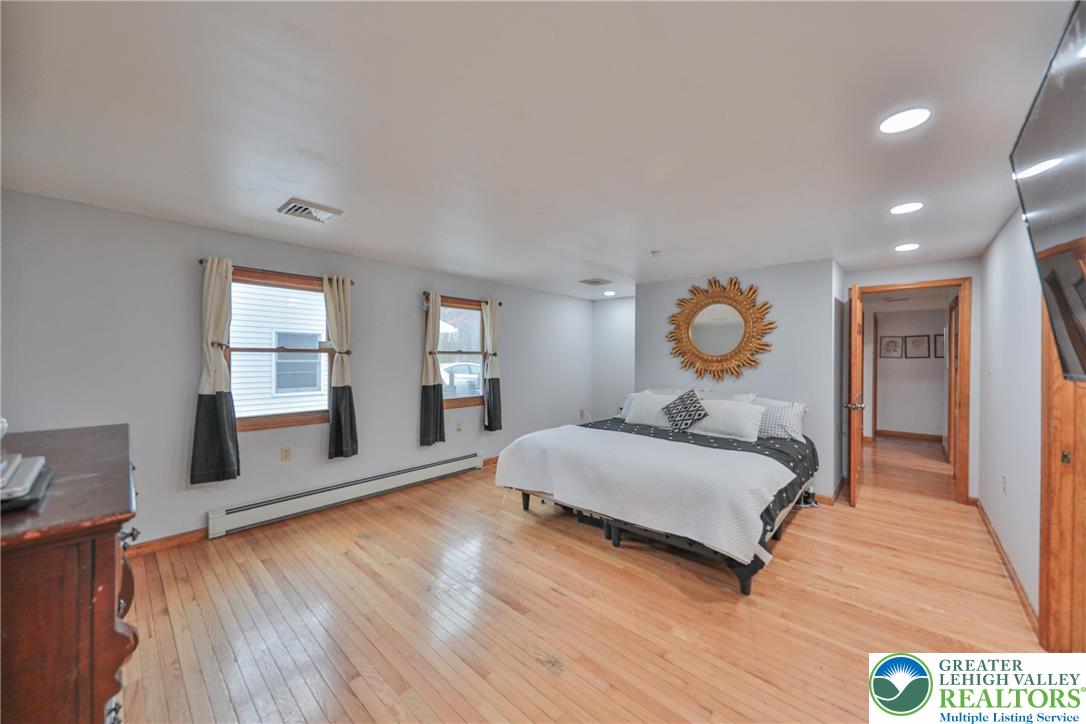 257 Hoffman Road Wind Gap, PA 18091 - Photo 4 of 52 a living room with furniture and wooden floor