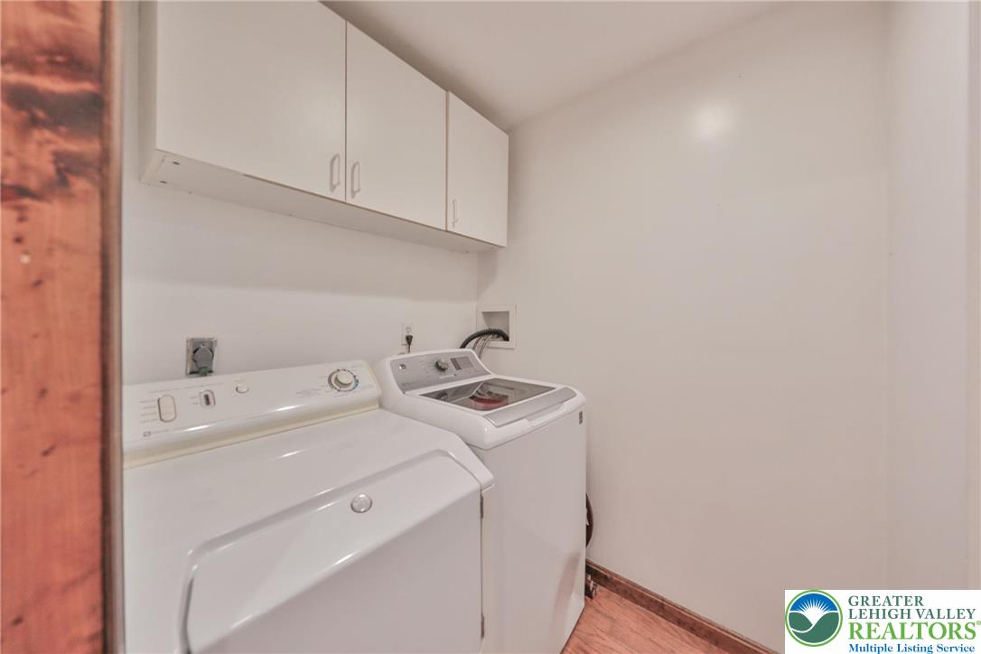 257 Hoffman Road Wind Gap, PA 18091 - Photo 42 of 52 a utility room with dryer and washer