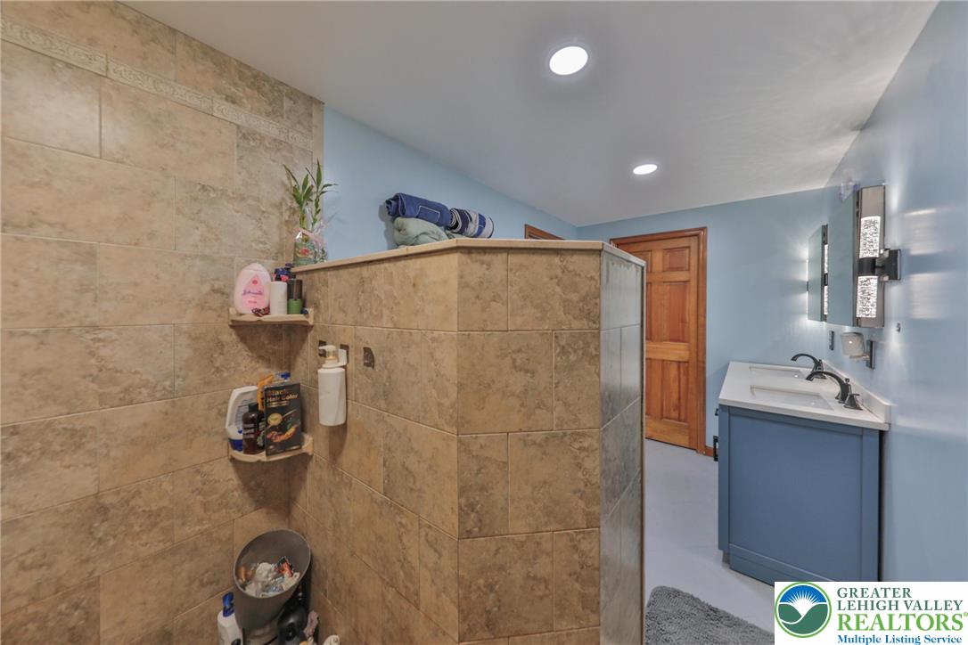 257 Hoffman Road Wind Gap, PA 18091 - Photo 10 of 52 a bathroom with a shower