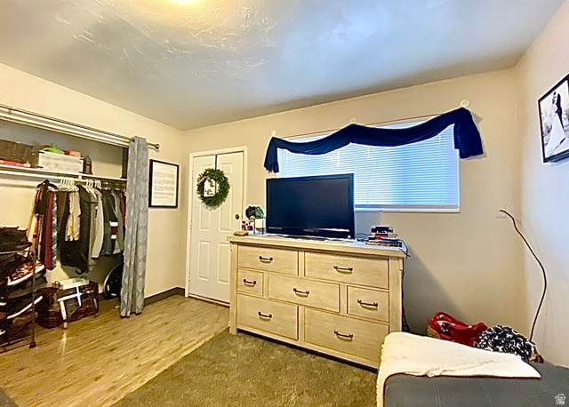 640 East 600 North Logan, UT 84321 - Photo 7 of 20 Bedroom with a closet and light wood-style floors
