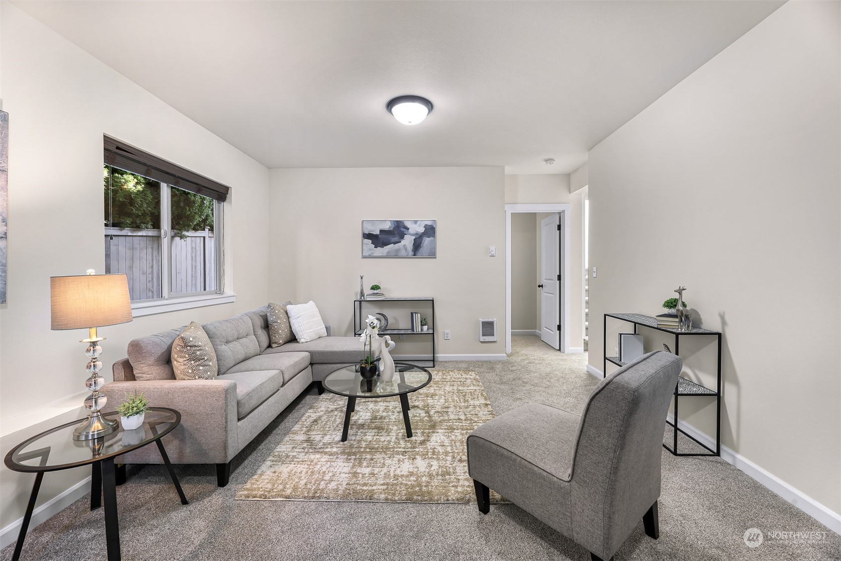 1500 Pierce Avenue Northeast Renton, WA 98056 - Photo 33 of 40 a living room with furniture and a lamp