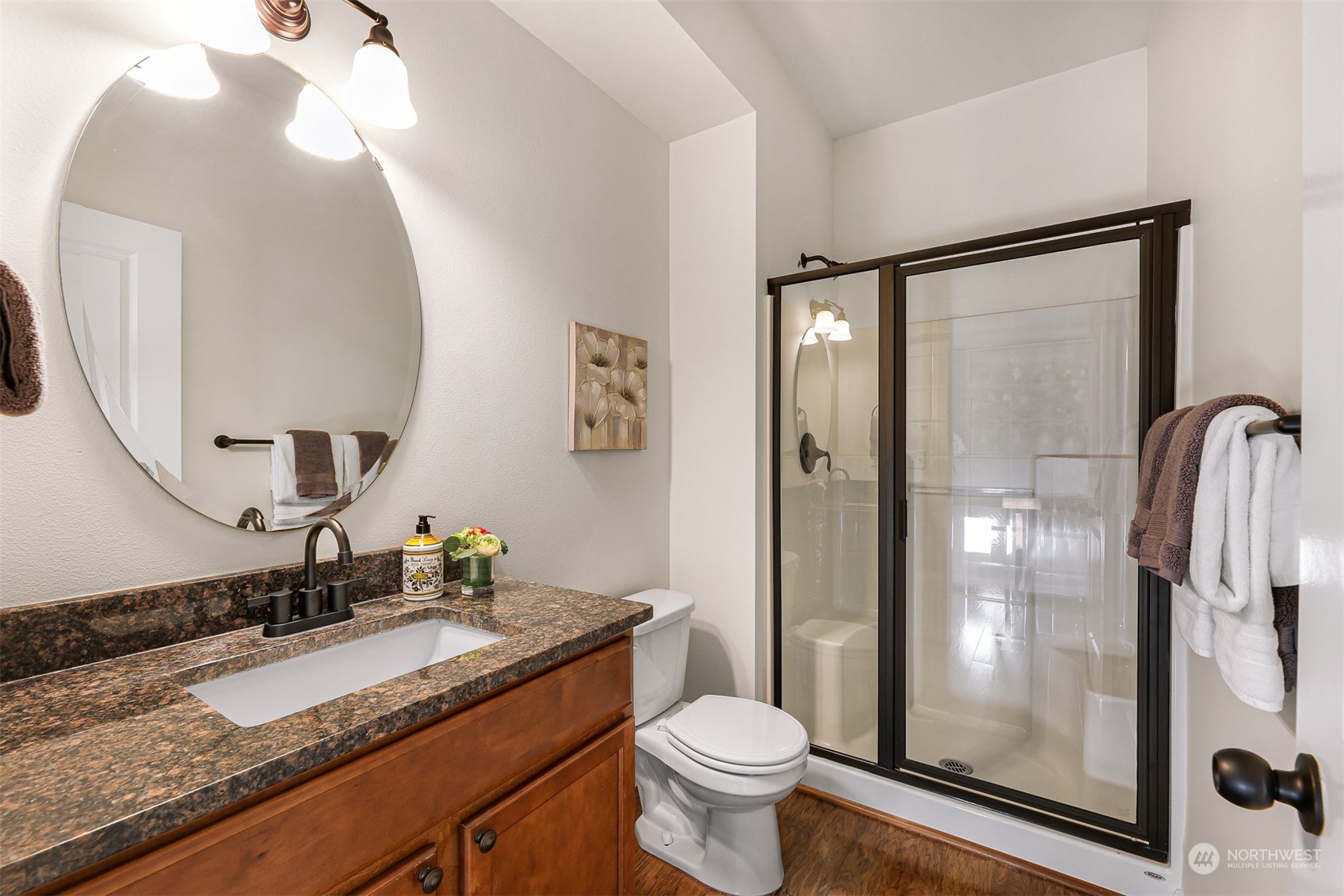 1500 Pierce Avenue Northeast Renton, WA 98056 - Photo 6 of 40 a bathroom with a granite countertop sink toilet and shower