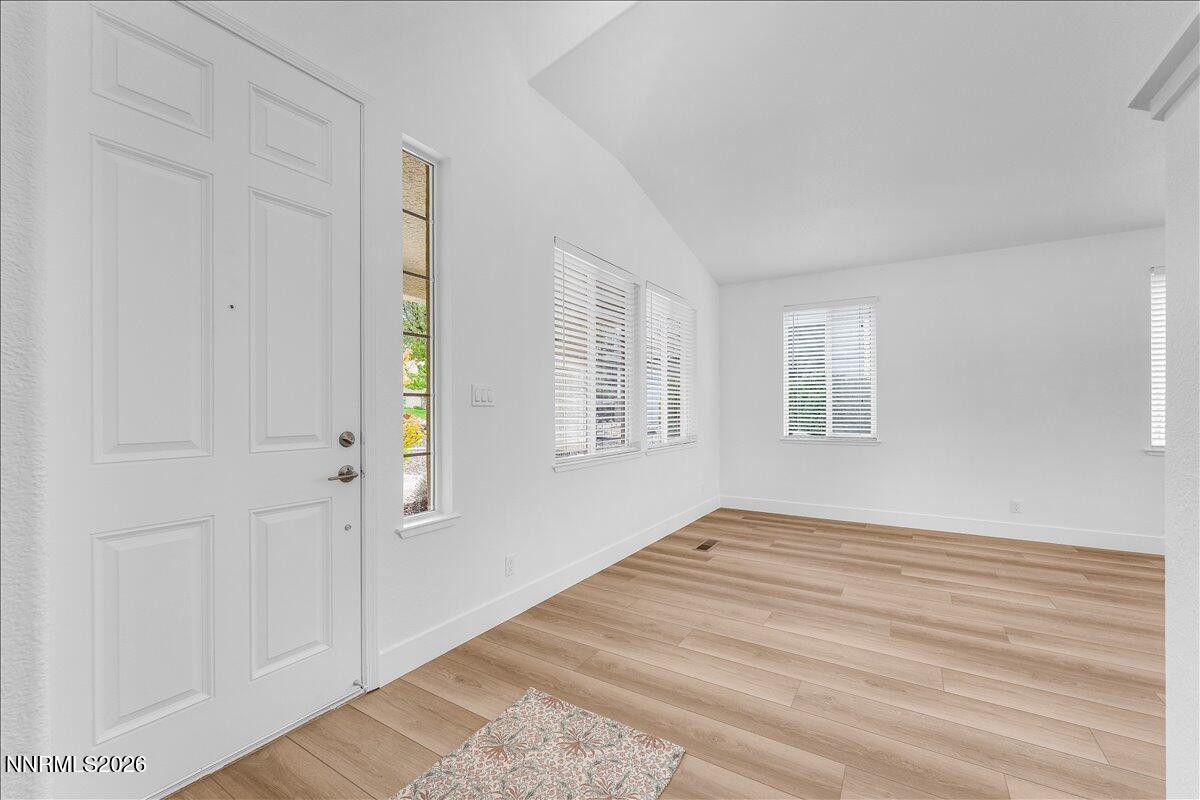 2329 Red Maple Court Reno, NV 89523 - Photo 4 of 39 a view of an empty room with window and closet area
