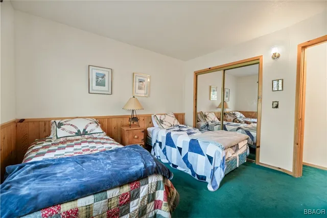 a bed room with a bed and a couch