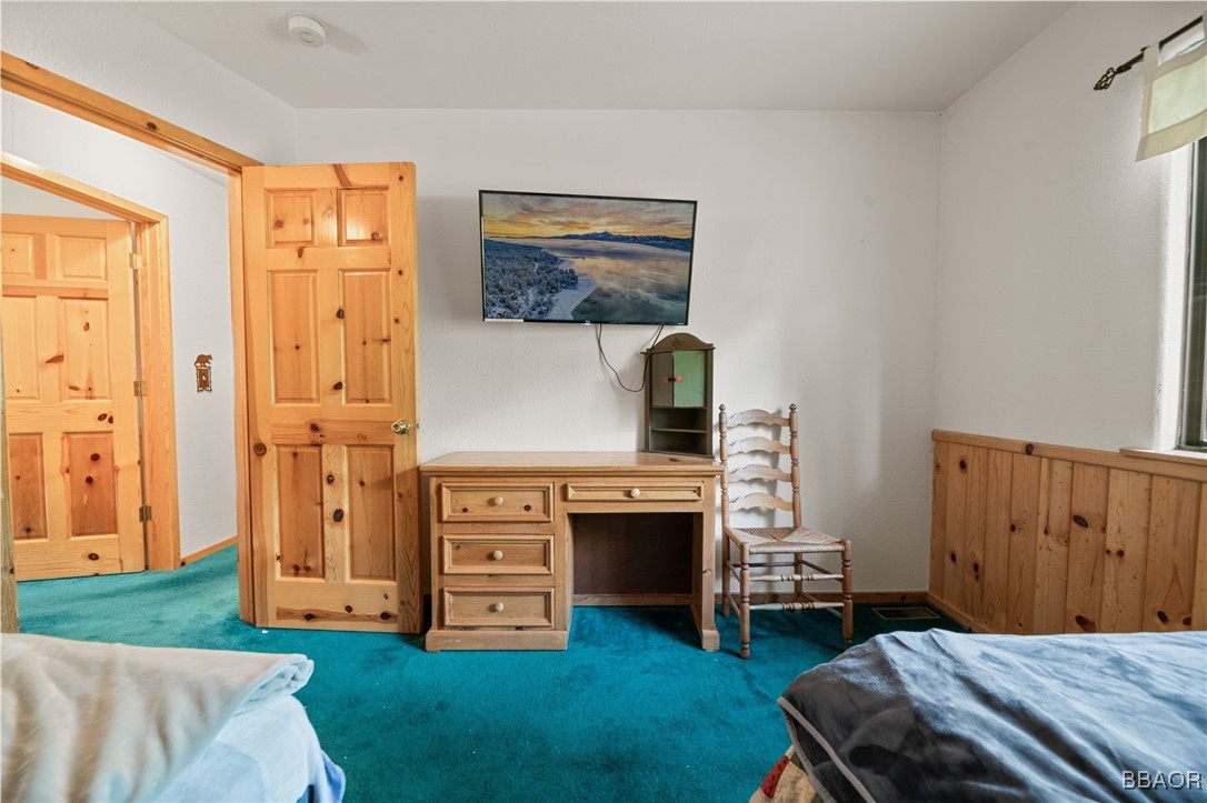 1464 Rockspray Drive Big Bear Lake, CA 92315 - Photo 18 of 26 a view of a livingroom with furniture and a fireplace