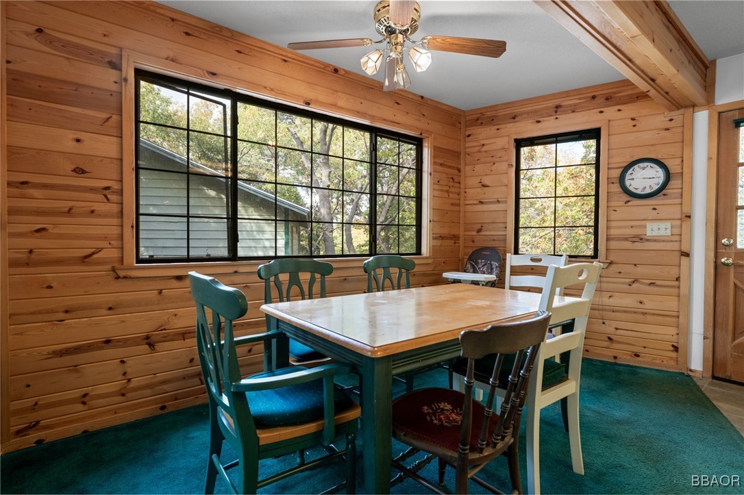 1464 Rockspray Drive Big Bear Lake, CA 92315 - Photo 8 of 26 a view of a dining room with furniture and window
