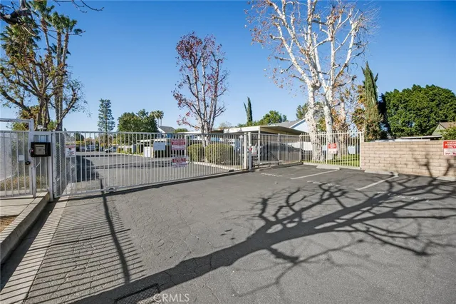 a view of a house with a tree