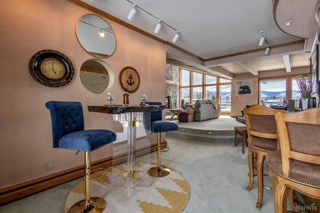 a view of swimming pool with outdoor seating