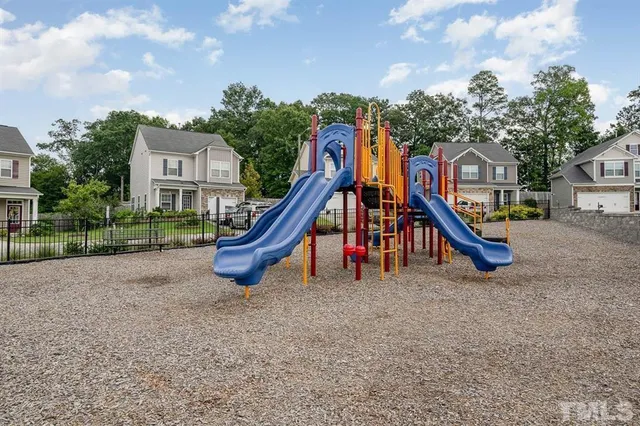 a view of a house with a park