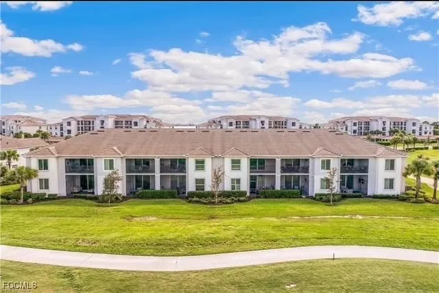 a front view of a house with a swimming pool
