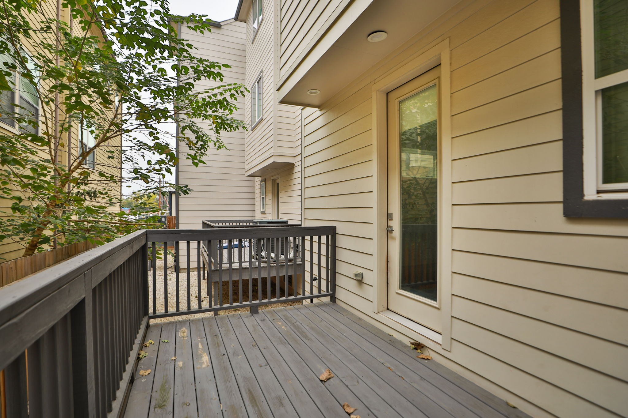 1537 West 24th Street, Unit C Houston, TX 77008 - Photo 33 of 34 a view of balcony with wooden floor