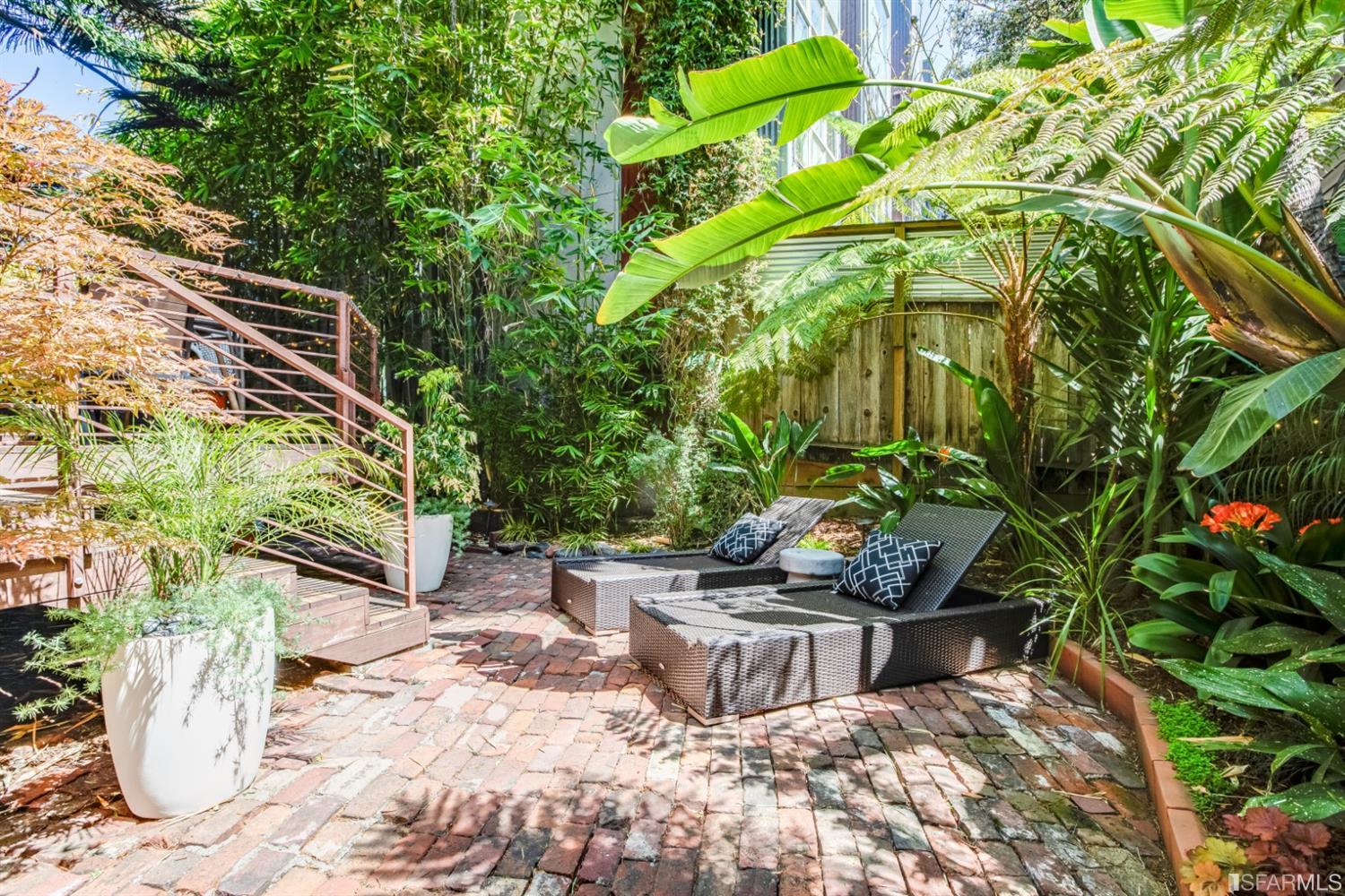 275 Shipley San Francisco, CA 94103 - Photo 21 of 95 a view of a backyard with chair and potted plants