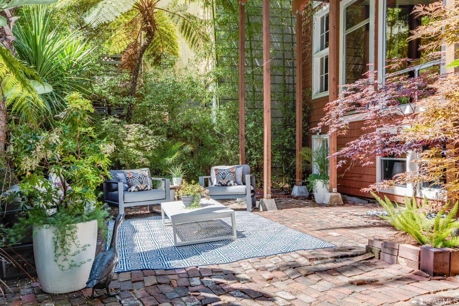 275 Shipley San Francisco, CA 94103 - Photo 26 of 95 a view of a patio with couches and potted plants