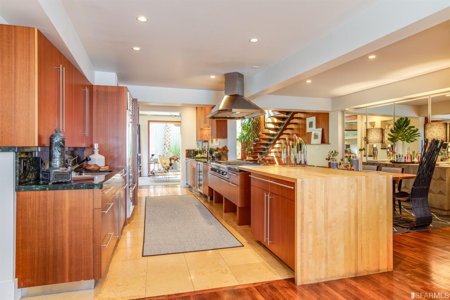 275 Shipley San Francisco, CA 94103 - Photo 38 of 95 a large kitchen with stainless steel appliances granite countertop a large counter top a stove and a refrigerator
