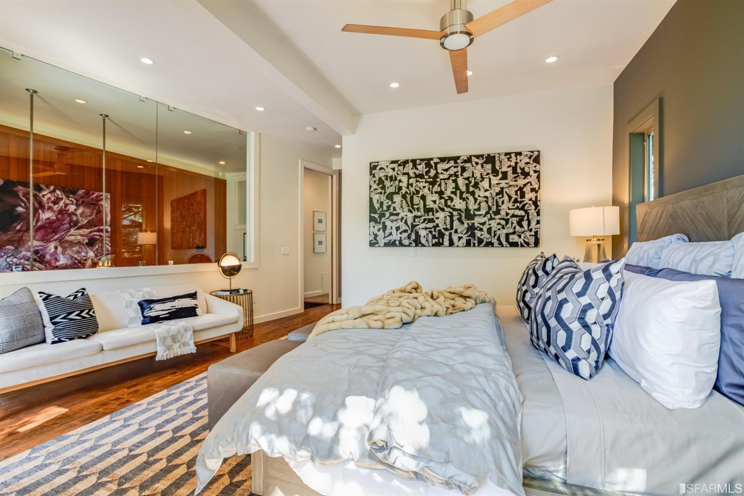 275 Shipley San Francisco, CA 94103 - Photo 52 of 95 a bedroom with furniture and a large mirror