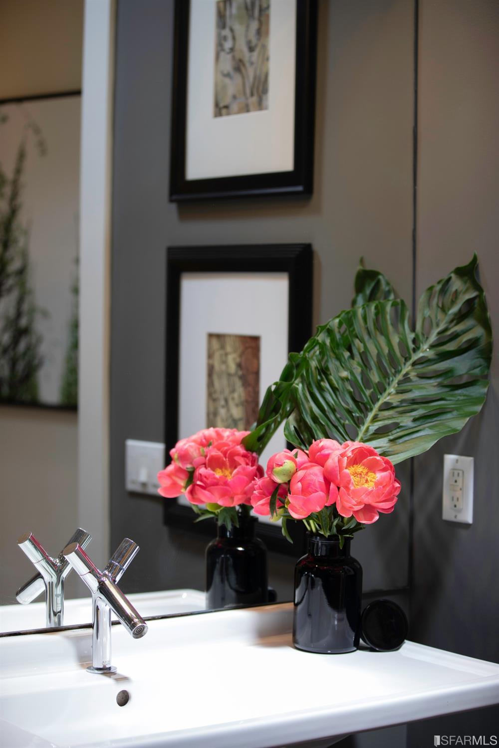 275 Shipley San Francisco, CA 94103 - Photo 67 of 95 a bathroom with a sink mirror and vanity