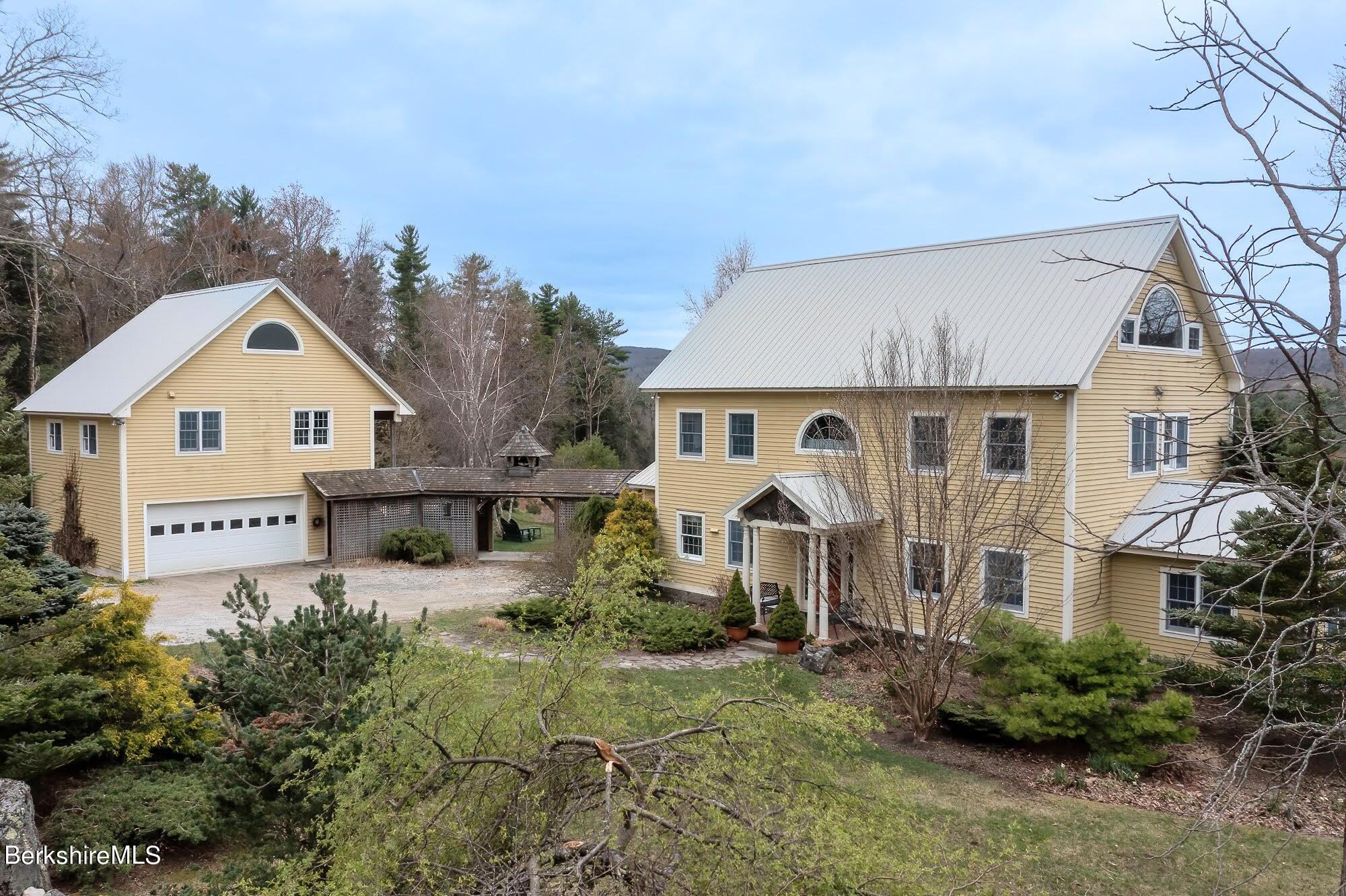 78 Mountain Road South Egremont, MA 01258 - Photo 1 of 34 a front view of a house with a yard