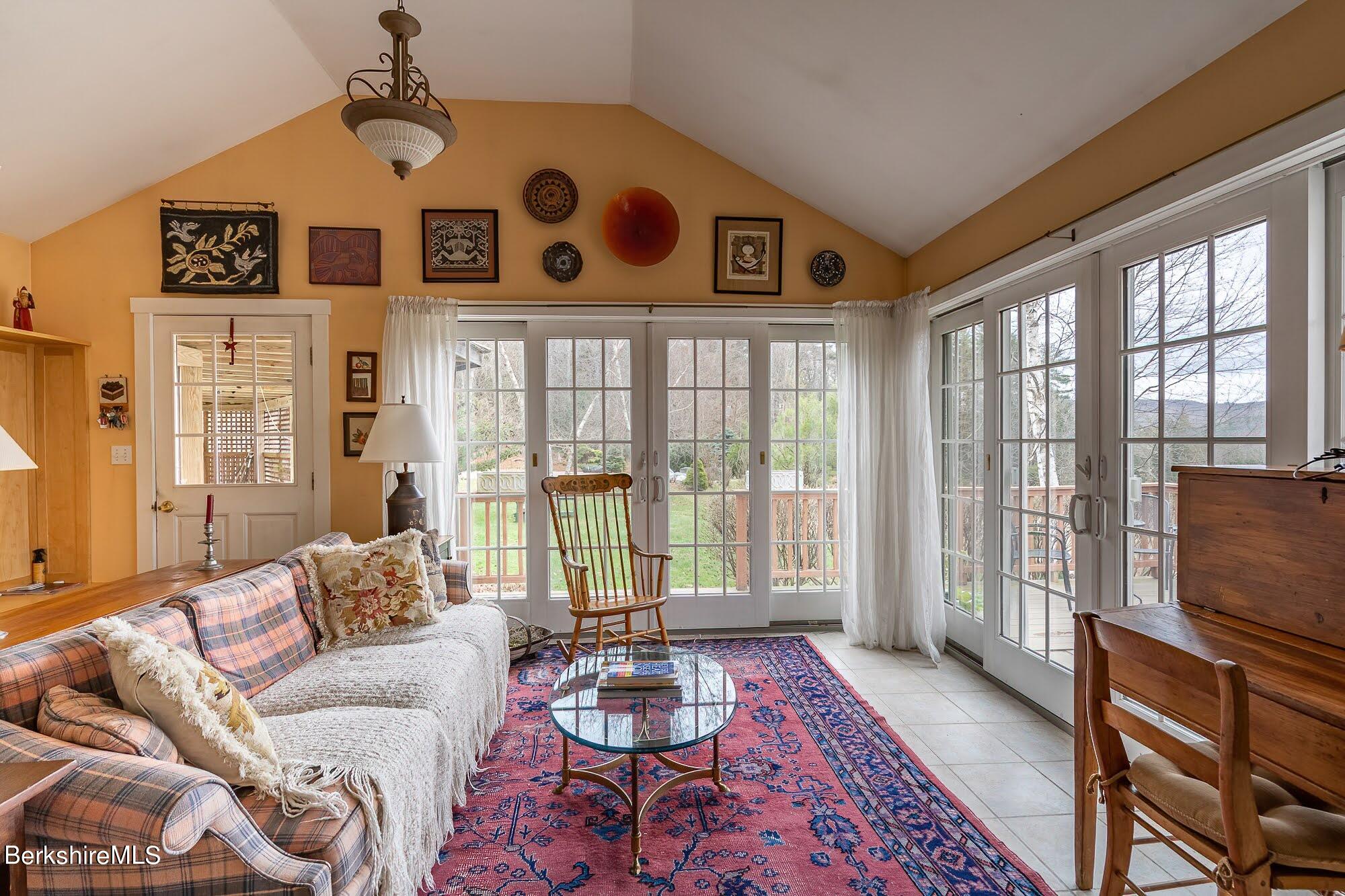 78 Mountain Road South Egremont, MA 01258 - Photo 14 of 34 a living room with furniture and a flat screen tv