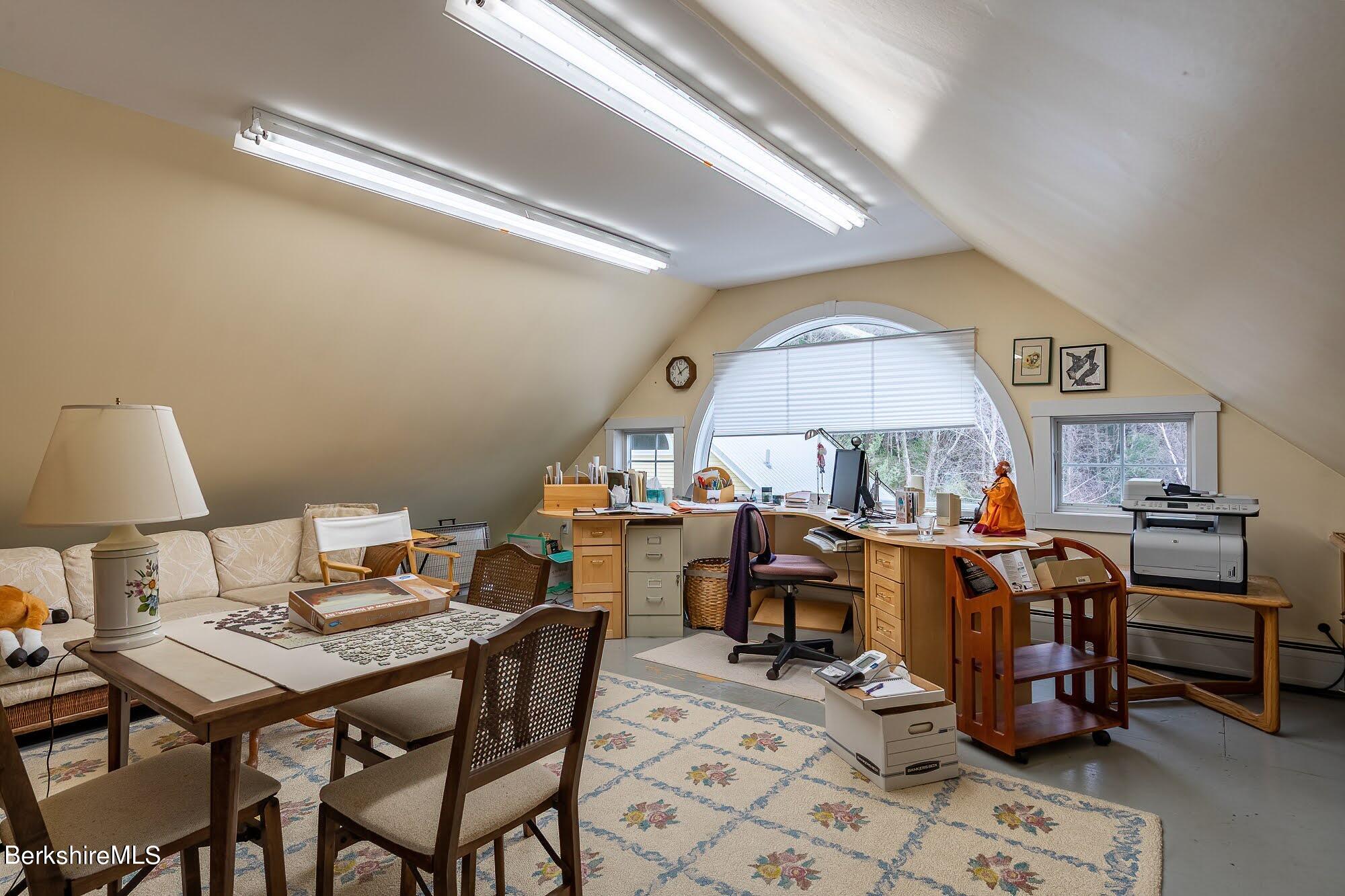 78 Mountain Road South Egremont, MA 01258 - Photo 27 of 34 a workspace with furniture and a chandelier