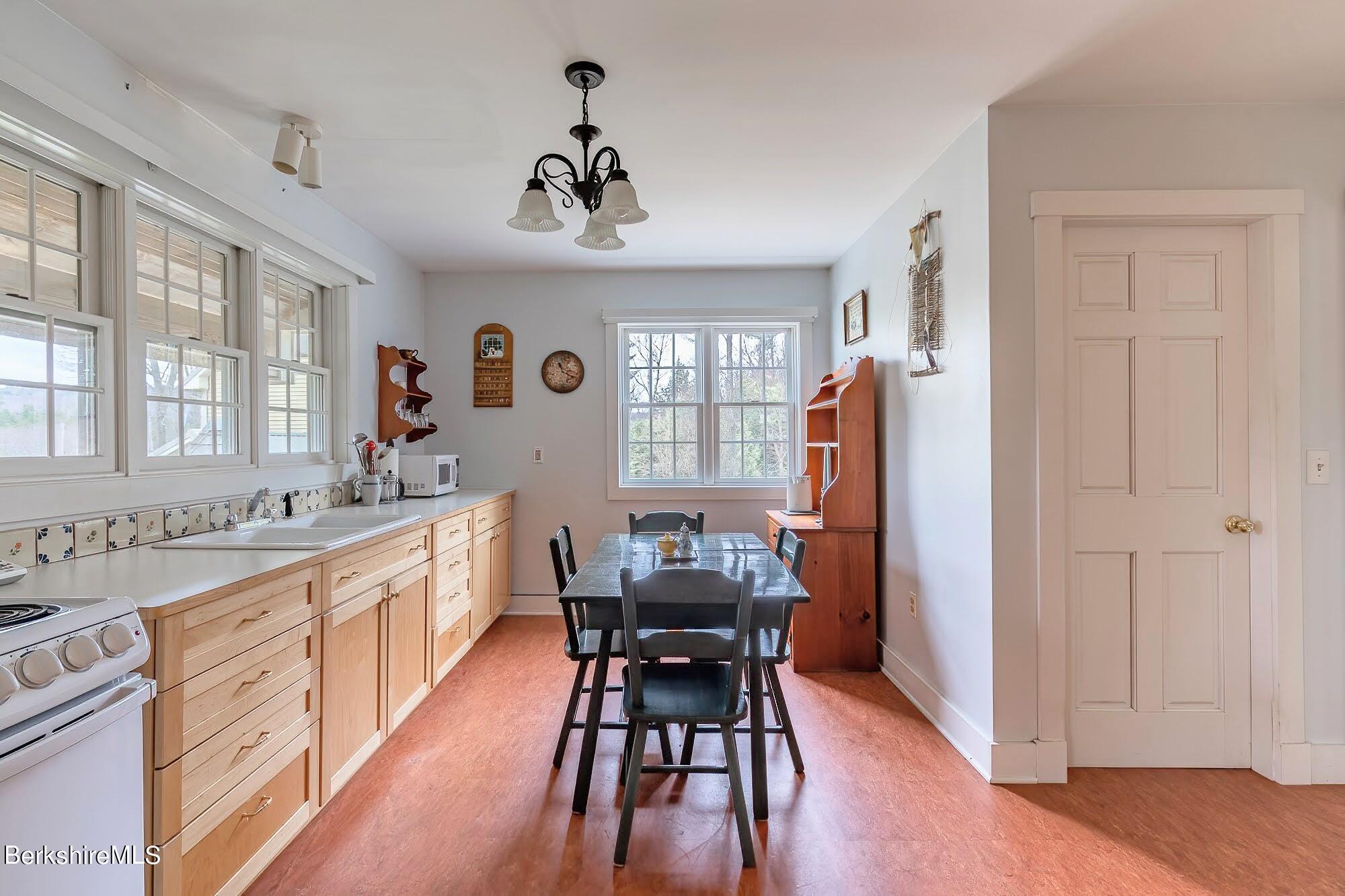 78 Mountain Road South Egremont, MA 01258 - Photo 31 of 34 a view of a dining room with furniture window and wooden floor