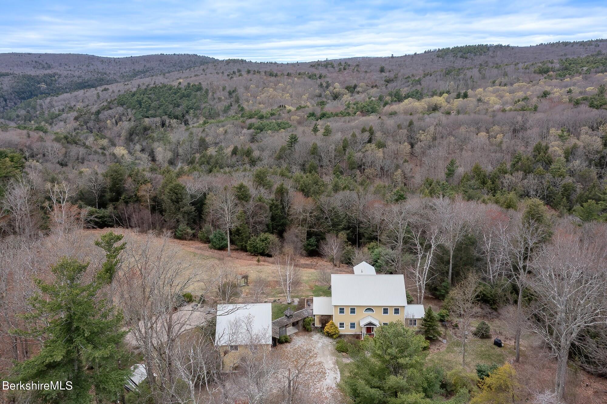 78 Mountain Road South Egremont, MA 01258 - Photo 34 of 34 an aerial view of a house with a field