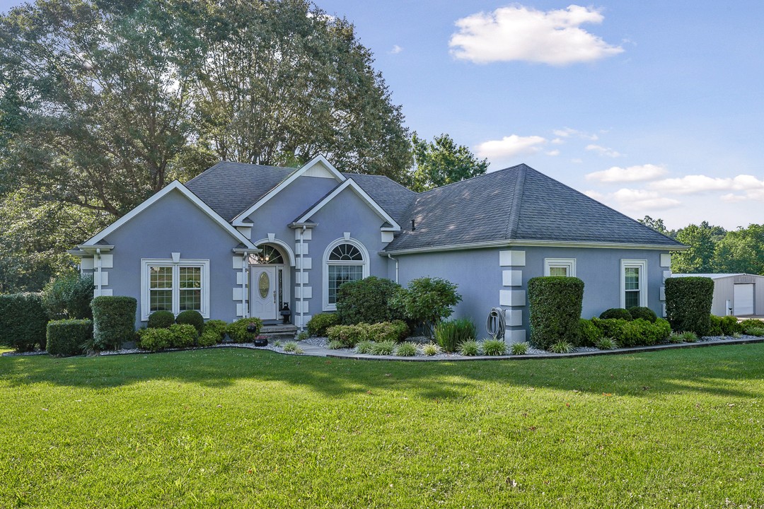 245 Faith-Rae Boulevard Morrison, TN 37357 - Photo 2 of 55 a front view of a house with a yard