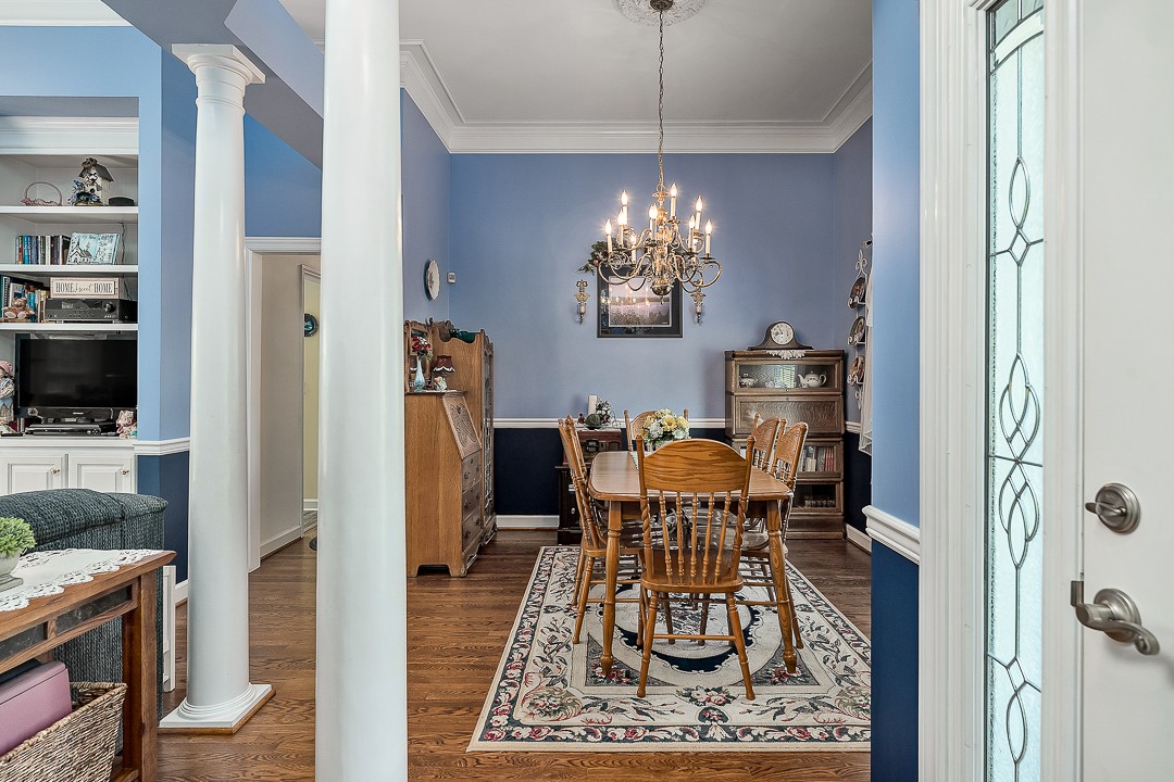 245 Faith-Rae Boulevard Morrison, TN 37357 - Photo 46 of 55 a view of a dining room with furniture a chandelier and wooden floor