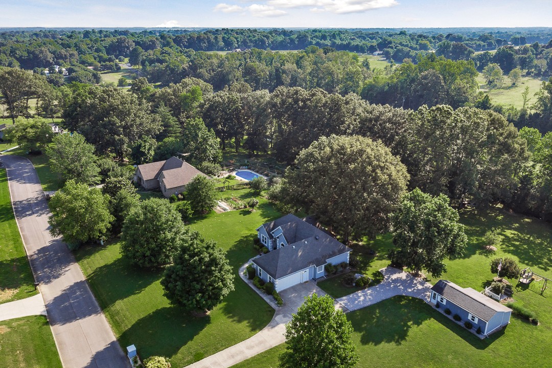 245 Faith-Rae Boulevard Morrison, TN 37357 - Photo 6 of 55 an aerial view of a house with a garden