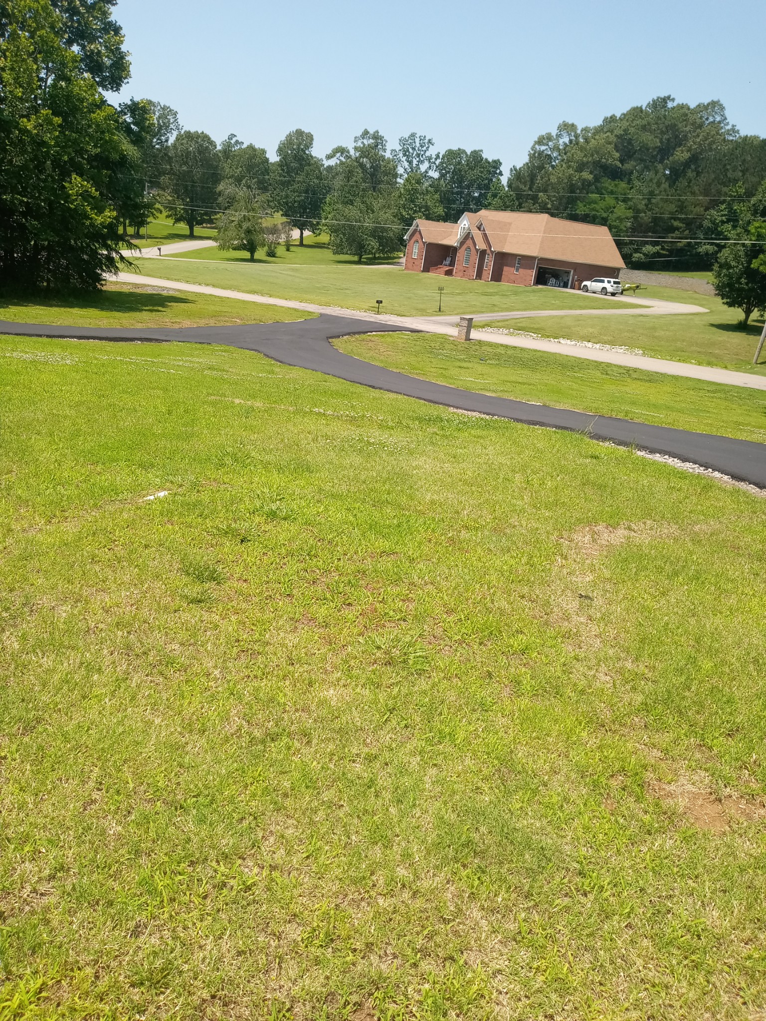 652 Timber Ridge Drive Lexington, TN 38351 - Photo 23 of 28 a front view of a house with a ocean view