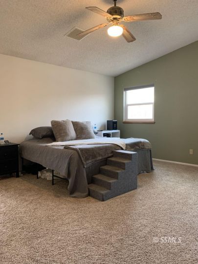 807 James Street Ridgecrest, CA 93555 - Photo 16 of 37 a living room with furniture and a window