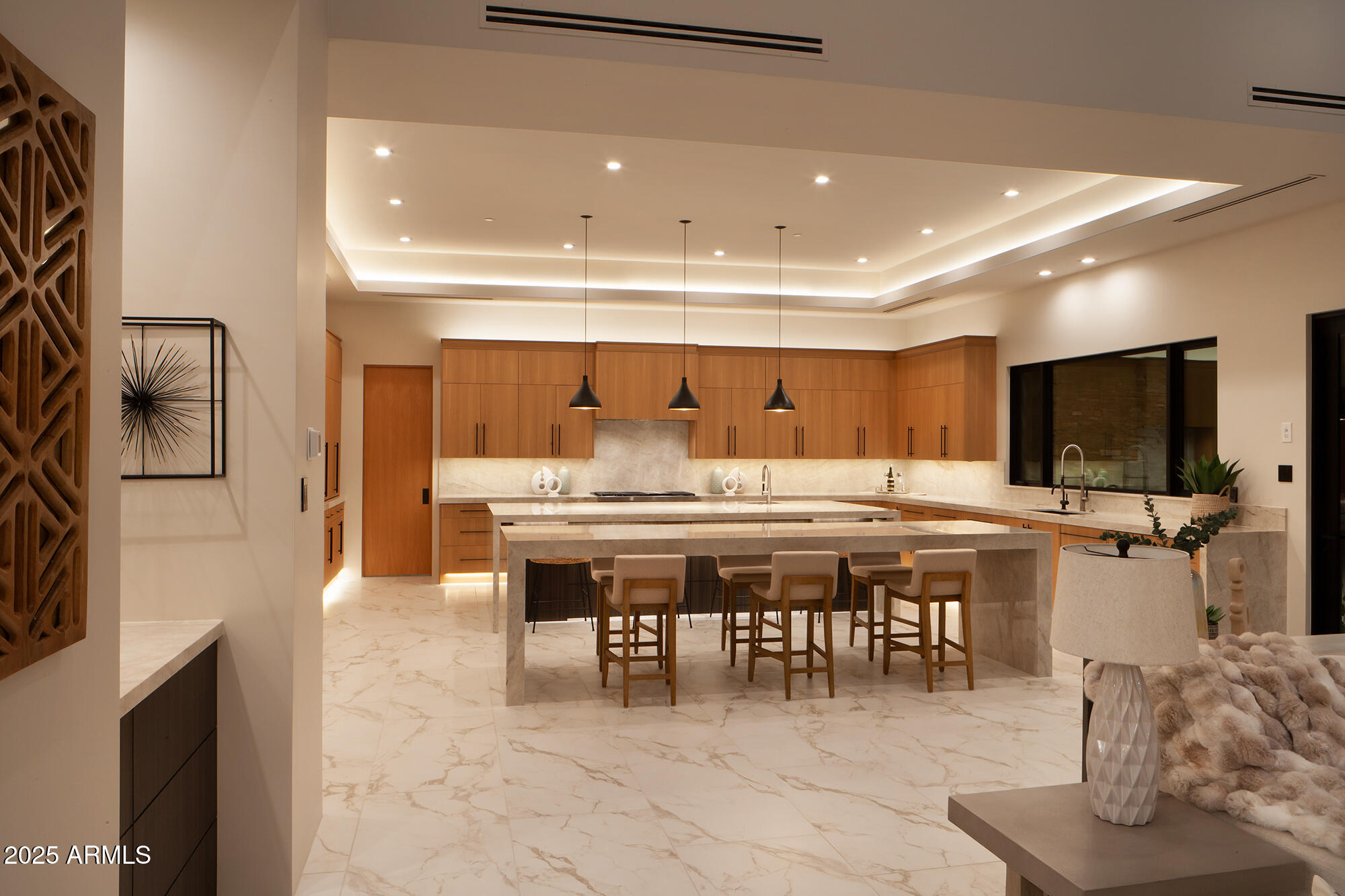 29646 North 109th Place, Unit 128 Scottsdale, AZ 85262 - Photo 13 of 45 a large kitchen with a table and chairs in it