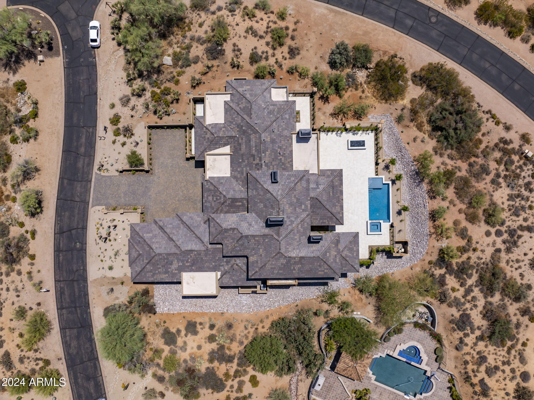 29646 North 109th Place, Unit 128 Scottsdale, AZ 85262 - Photo 42 of 45 an aerial view of residential houses with outdoor space