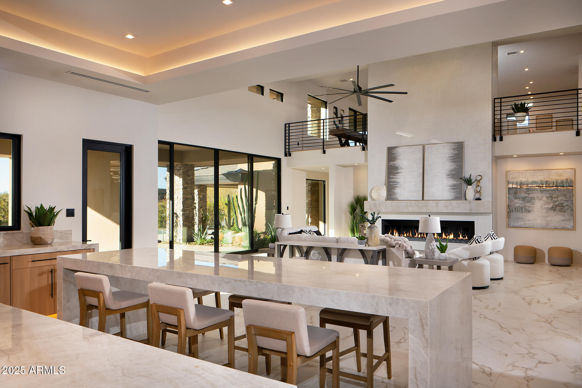 29646 North 109th Place, Unit 128 Scottsdale, AZ 85262 - Photo 6 of 45 a living room with lots of furniture and a chandelier