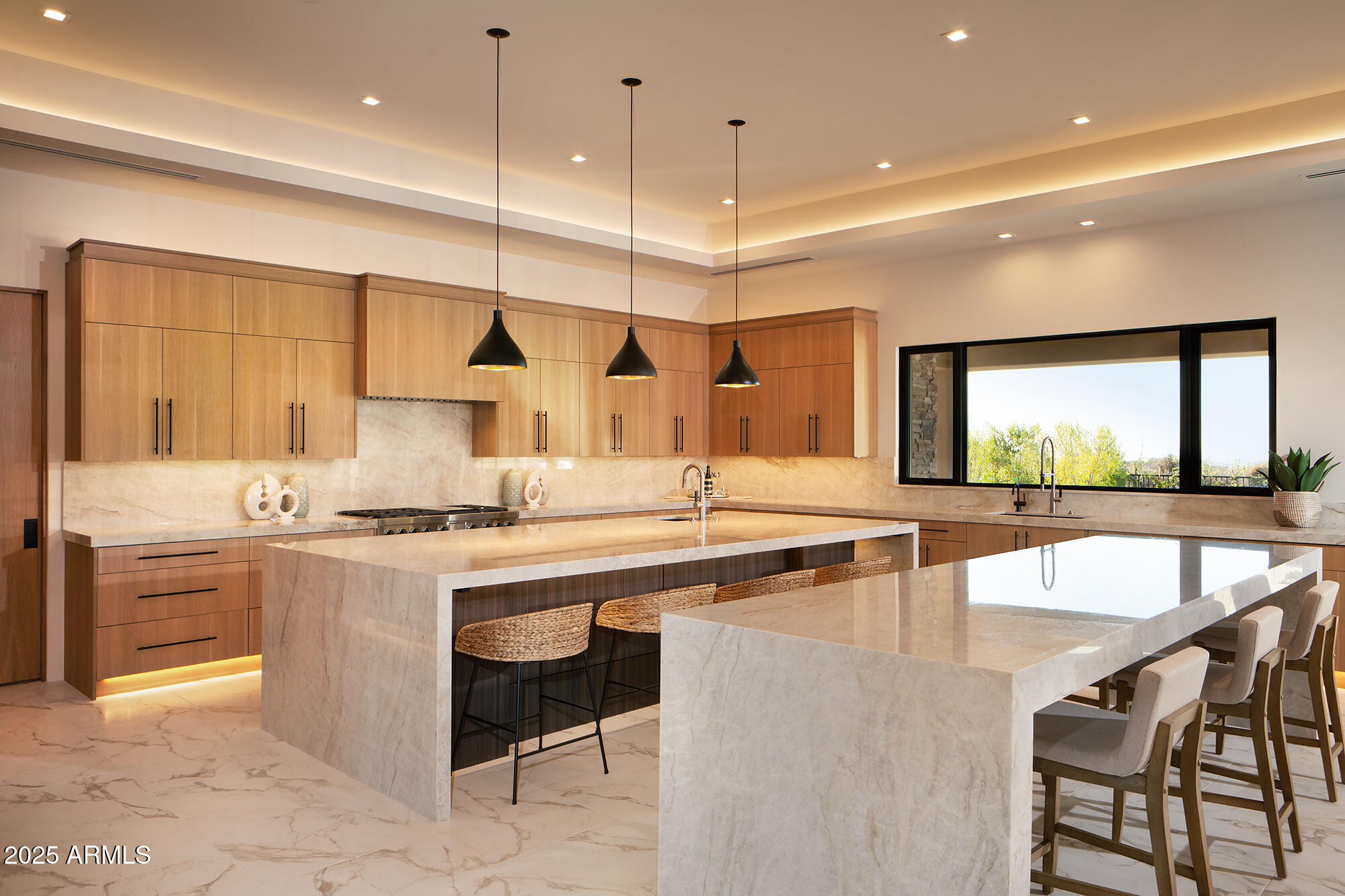 29646 North 109th Place, Unit 128 Scottsdale, AZ 85262 - Photo 8 of 45 a kitchen with stainless steel appliances granite countertop a stove a sink a oven a dining table and chairs with wooden floor