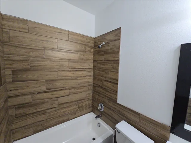 a bathroom with a bathtub