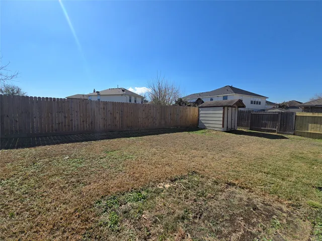 a house view with a garden space