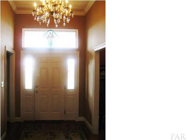 2060 Stallion Road Cantonment, FL 32533 - Photo 4 of 24 ENTRANCE FOYER HAS 11 FT CEILINGS, OAK FLOORING