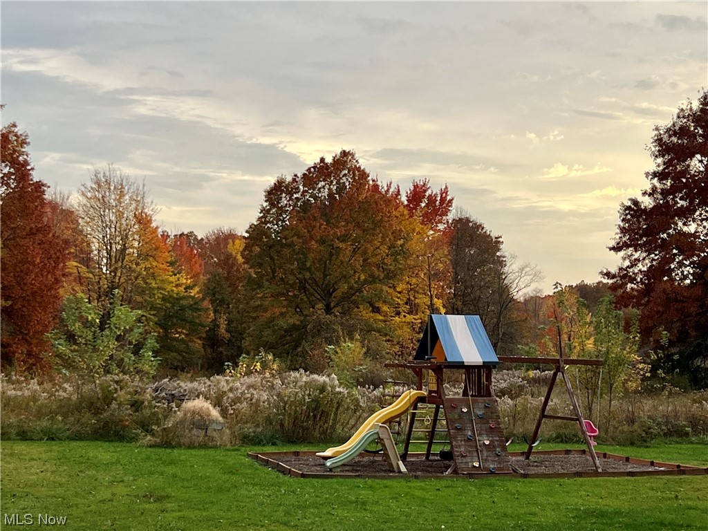 3992 Tallmadge Road Rootstown, OH 44272 - Photo 20 of 27 Playground at dusk featuring a yard