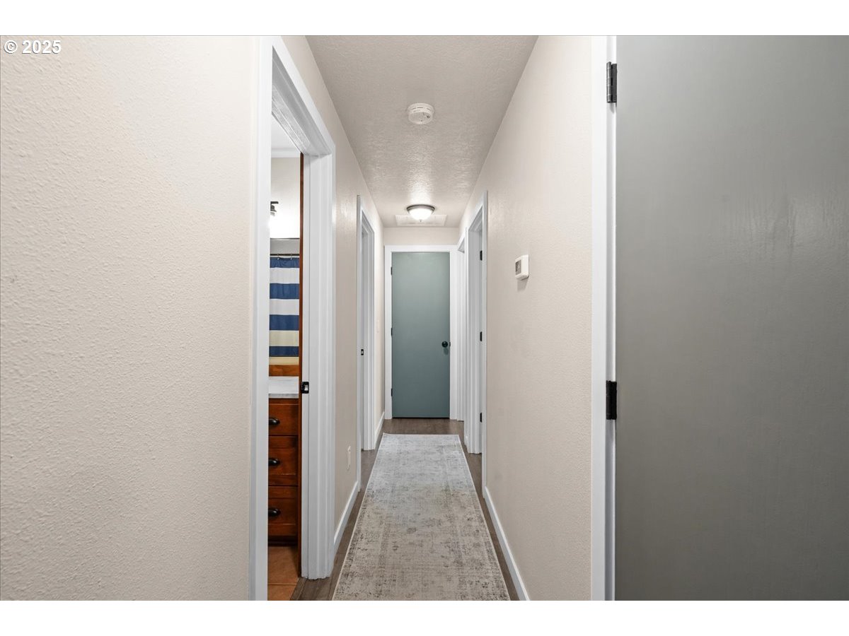 2788 South Beech Street Cornelius, OR 97113 - Photo 19 of 40 a view of a hallway with wooden floor