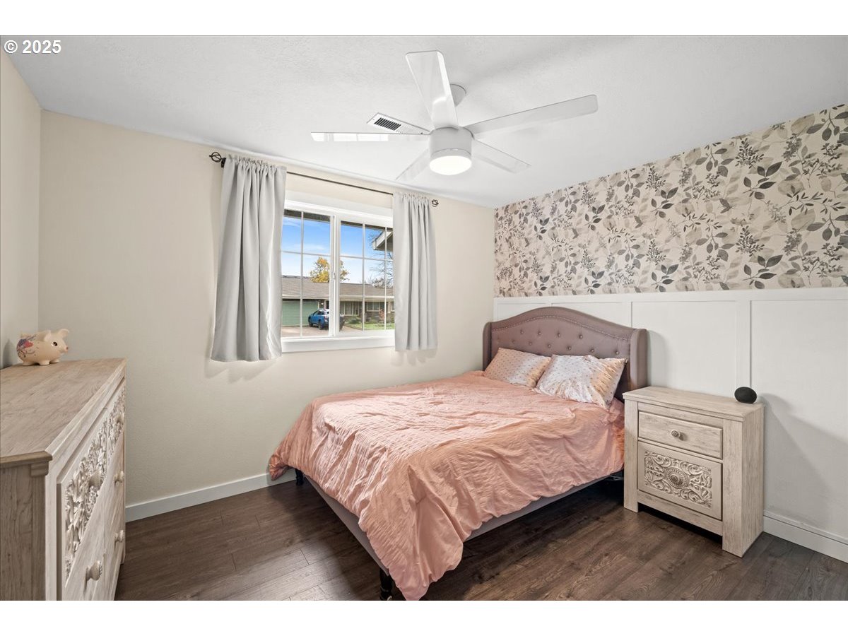 2788 South Beech Street Cornelius, OR 97113 - Photo 25 of 40 a bedroom with a bed and a dresser