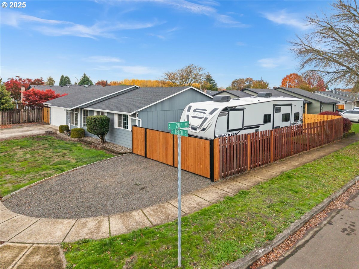 2788 South Beech Street Cornelius, OR 97113 - Photo 35 of 40 a view of a house with a yard and potted plants